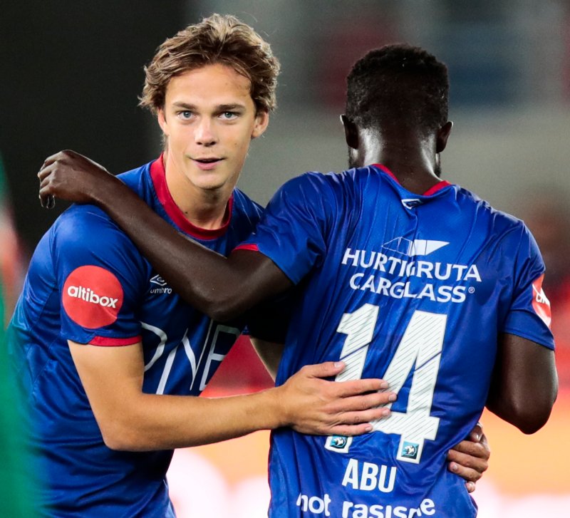 GODE MINNER: Felix Horn Myhre og Mohammed Abu jubler etter et mål mot Tromsø i Eliteserien. Foto: Lise Åserud / NTB scanpix