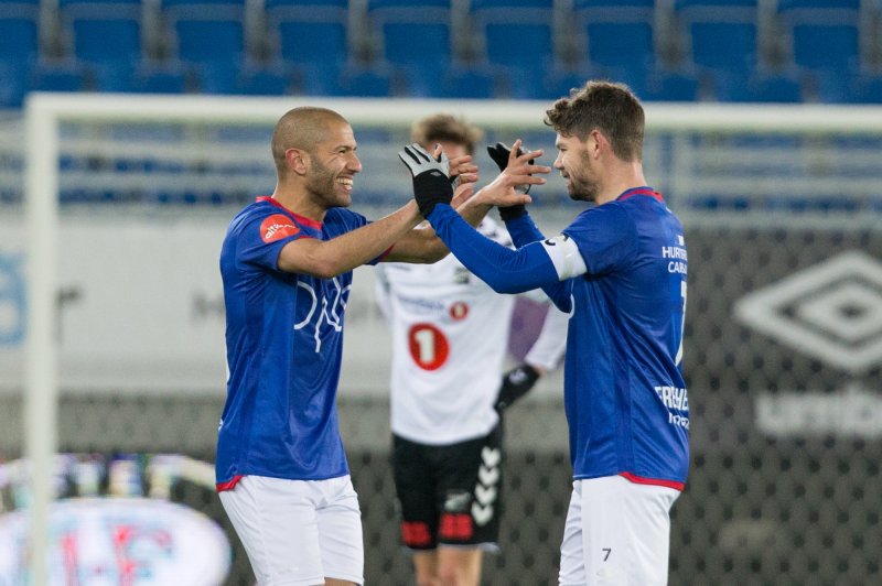 Amin Nouri og Daniel Fredheim Holm trives på høyresida (Foto: Fredrik Hagen / NTB scanpix)